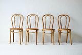 A Set Of Four French Bamboo Dining Chairs