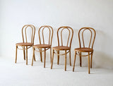 A Set Of Four French Bamboo Dining Chairs