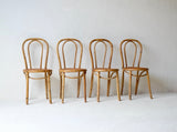 A Set Of Four French Bamboo Dining Chairs