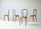 A Set Of Four French Bamboo Dining Chairs