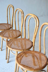 A Set Of Four French Bamboo Dining Chairs