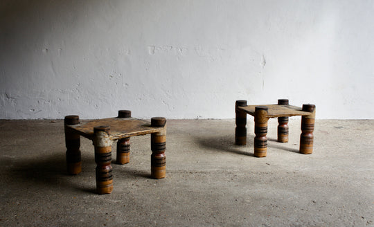 A PAIR OF AFRICAN HARDWOOD STOOLS