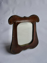 ANTIQUE LEATHER FRAMED CAMPAIGN MIRROR