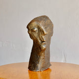 ORACLE PATINATED TERRACOTTA HEAD BY ALAN THORNHILL (1921-2020)