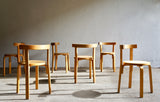 A SET OF 6 BENT PLYWOOD CHAIRS